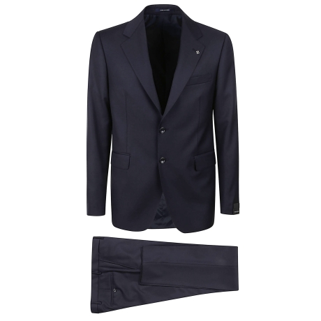 Tagliatore abito uomo con giacca monopetto blu
